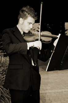 Matthew playing his violin